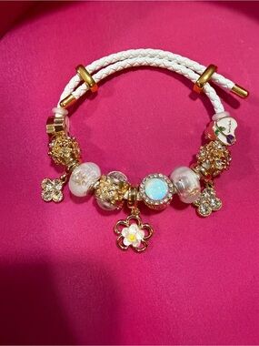 White Braided Leather Charm Bracelet with Gold Flower Charms